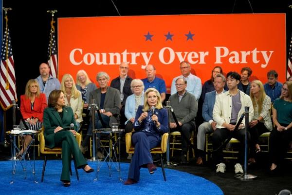 Democratic presidential nominee Vice President Kamala Harris listens as Former Republican Co<em></em>ngresswoman Liz Cheney speaks during a town hall at The People's Light in Malvern, Pa., Monday, Oct. 21, 2024. (AP Photo/Matt Rourke)